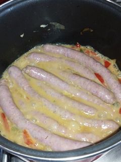 Una foto de Salchichas frescas al vino