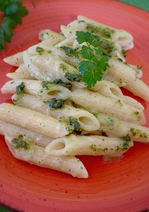A picture of Risotto-Style Penne with Zucchini and Parsley Pistachio Pesto.