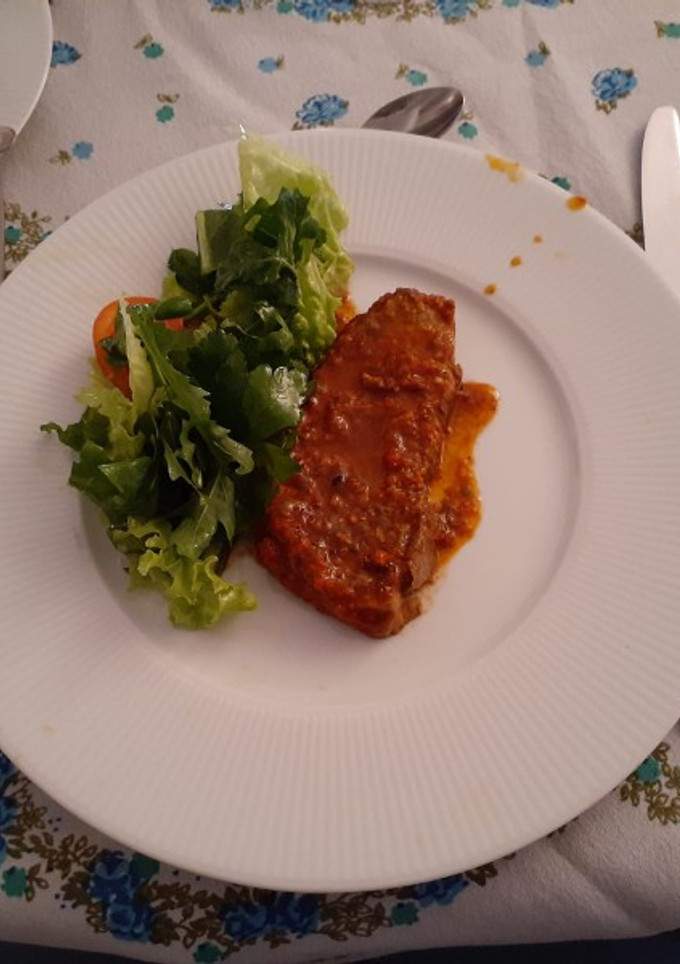 Una foto de Bife de chorizo al horno con costra de tomates secos