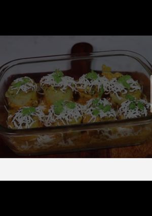 A picture of Aloo dum with cheese.