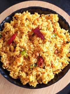 खट्टे तीखे चावल (Khatte teekhe chawal recipe in hindi) रेसिपी मुख्य फोटो