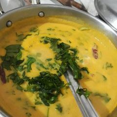 A picture of Gur mix Green kadhi.