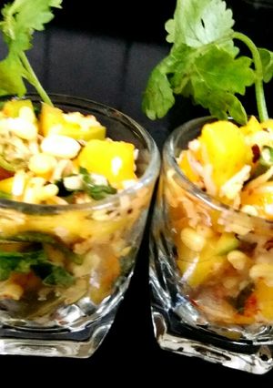 A picture of Raw mango salad shots.