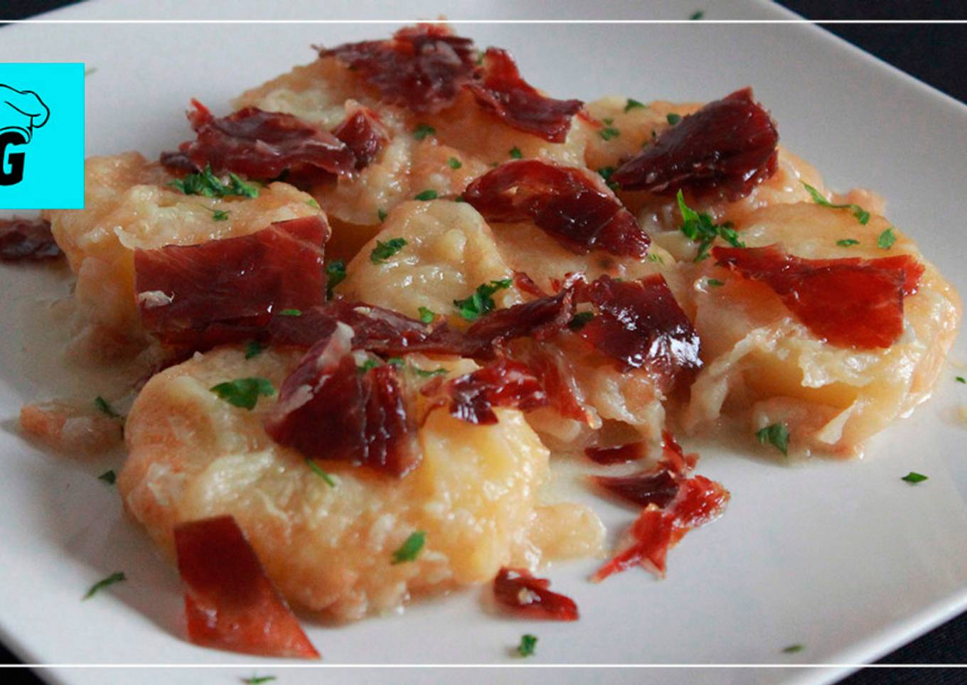 Patatas a la importancia con virutas de jam贸n 馃