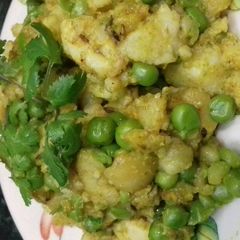 A picture of Fried aloo matar ki sabji.