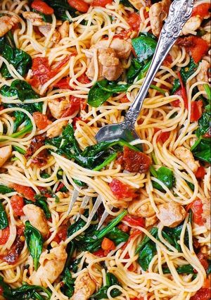 A picture of Healthy chicken or shrimp pasta.