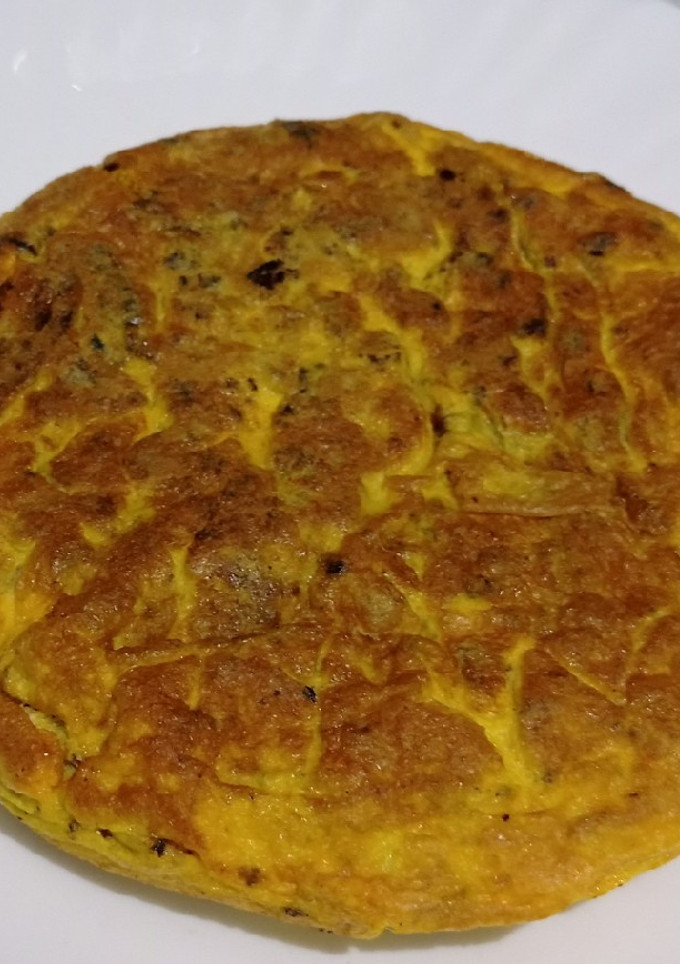 Una foto de Tortilla de morcilla