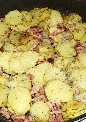 Une photo de Pommes de terre pesto/ parmesan
