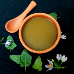 A picture of Purple fruited pea eggplant/ solanum trilobatum/ thuthuvalai soup (no oil, ghee, butter).