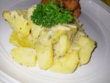Papas salteadas acompañadas de salchichas artesanales