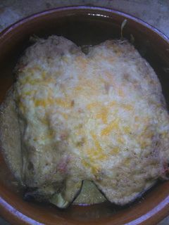 Una foto de Berenjena rellenas de pollo