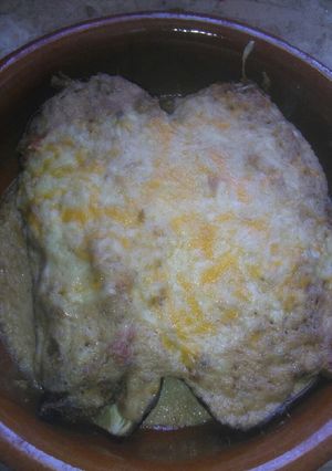 Una foto de Berenjena rellenas de pollo