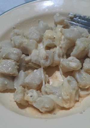 Una foto de Ñoquis con manteca y queso (para los niños que no querian salsa)