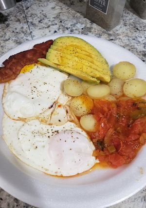 Una foto de Huevitos rancheros 🤤