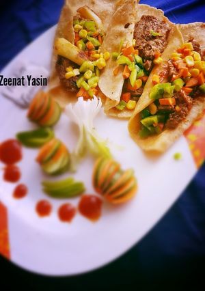 A picture of Jamaican beef tacos.