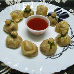 A picture of Steamed Chicken Money Bags and Wontons.