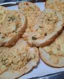 Pan con manteca a las hierbas y queso (al horno)