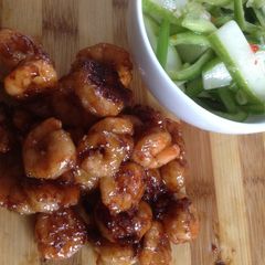A picture of Sticky basa and prawns with pickled veggies.