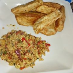 A picture of Egg sauce nd fried sweet potato.