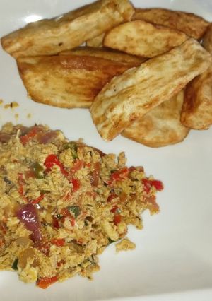 A picture of Egg sauce nd fried sweet potato.
