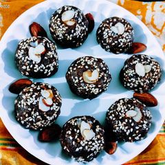 A picture of Vitamin rich antioxidant super healthy almond and dates mix dry fruits ladoo.
