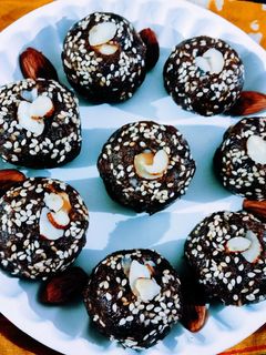 A picture of Vitamin rich antioxidant super healthy almond and dates mix dry fruits ladoo.