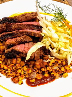A picture of Mexican Rubbed Steak w/ Chorizo Potatoes & Mango Habanero Salsa.