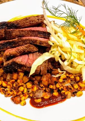 A picture of Mexican Rubbed Steak w/ Chorizo Potatoes & Mango Habanero Salsa.