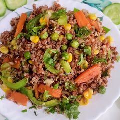 A picture of Stir-fried Red Rice and Veggies.
