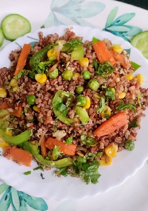 A picture of Stir-fried Red Rice and Veggies.