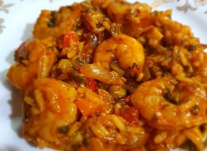 Una foto de Camarón con arroz