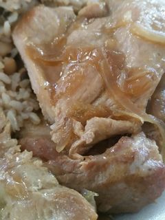 Una foto de Cerdo encebollado