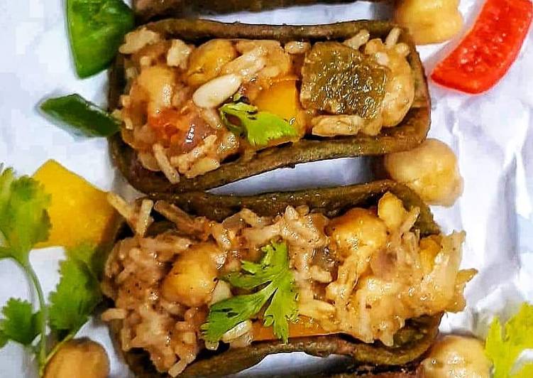 Crispy spinach tacos stuffed with cheesy chickpeas