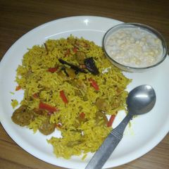 A picture of Soya pulao with raita.