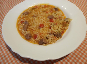 Una foto de Arroz Caldoso con mollejas de pollo