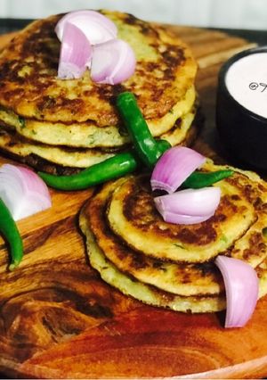 A picture of Cucumber Masala Pancake or Tawasyachi Ghari.