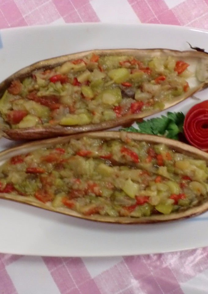 Una foto de Berenjenas rellenas de verdura