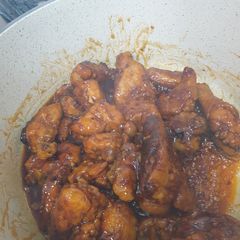 A picture of Chicken on Buffalo sauce.