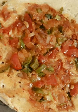 A picture of Schezwan Uttapam.