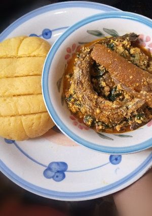 A picture of Palm oil Semo with Melon Soup.