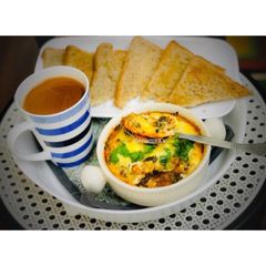 Italian Baked Eggs Breakfast with the Traditional Marinara A picture of Italian Baked Eggs Breakfast with the Traditional Marinara.