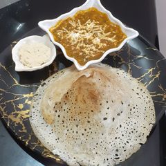 A picture of Spinach sabji with Dosa.