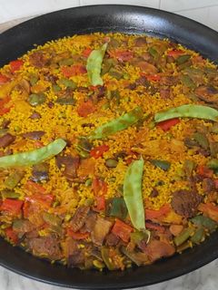 Una foto de Arroz con heura, rovellones, calabizo y verduras