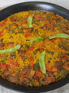 Una foto de Arroz con heura, rovellones, calabizo y verduras