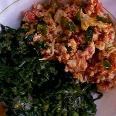 A picture of Scrambled eggs and kales.