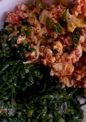 A picture of Scrambled eggs and kales.