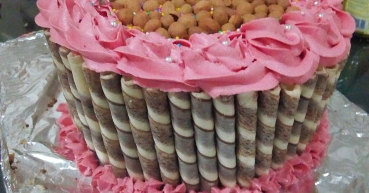 Epic Gold Wafer Stick Cake with Smarties | A fun alternative to a loaded  KitKat cake. Here we have a 3 tier beast, decorated with smarties and wafer  sticks. I have coated