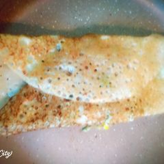 Sweetcorn sprouts sandwich Dosa A picture of Sweetcorn sprouts sandwich Dosa.