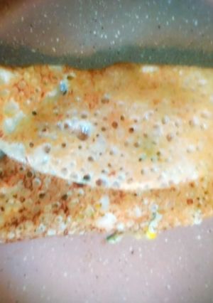 A picture of Sweetcorn sprouts sandwich Dosa.