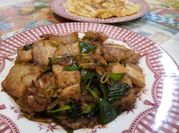 A picture of pork belly with leek